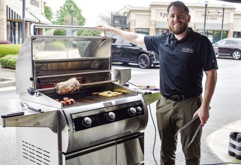 Stephen Montgomery of Fire Magic Premium Grills cooked brats, burgers, grilled fruit, pizza and more to show off one of the company’s grills. CONTRIBUTED