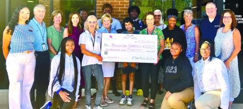 Posing among several GCCA students are (left to right, center row): GCCA board member and Communications Director Mariana Mansfield, Thillen Education Foundation President Dave Thillen, Nancy Marshall, Rebecca Prance, Foundation co-founder and 100 Women Who Care member Elaine Thillen, Eloise Wenz, Susan Dufford, GCCA Operations Director Shannon Daniel, volunteer student coach and foundation member Jenny Santee, Greene County College and Career Academy CEO John Ellenberg and 100 Women Who Care member Tracy S