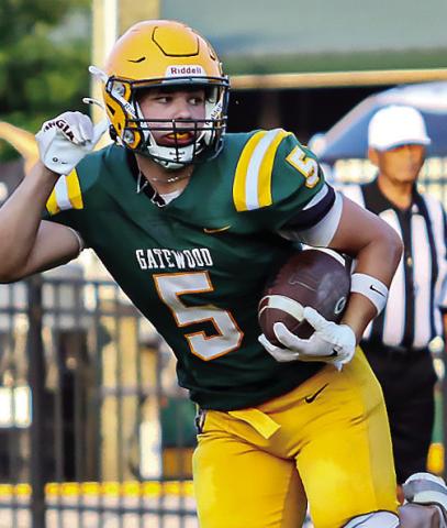 Gatewood running back Brady Haley runs downfield behind his blockers during a preseason scrimmage July 31. TREY NORRIS/Staff