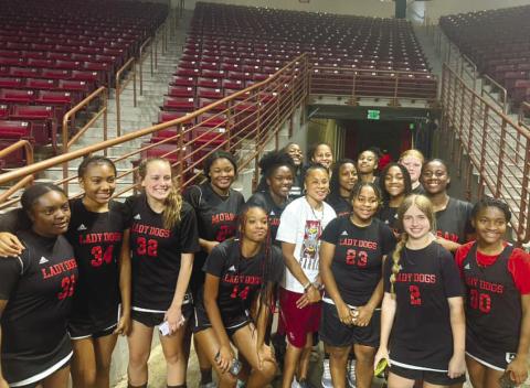 The Lady Bulldogs with South Carolina women’s basketball coach Dawn Staley after attending her camp last week. CONTRIBUTED