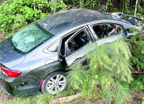 Seven people were fortunate to all escape injury in this crashed car early this month on Hogan Industrial Boulevard. LYNN HOBBS/Staff