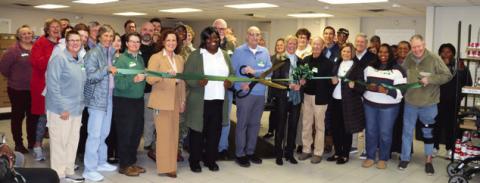 GCFP Chairman Steve Ruzika cuts the ribbon to celebrate the new facility, alongside friends, employees, and volunteers. CONTRIBUTED