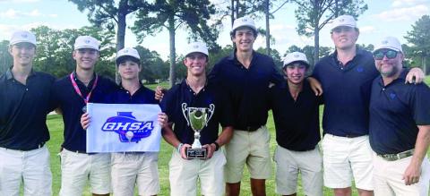 Head coach John Tillery (far right) has plenty to celebrate as he poses with Lake Oconee Academy’s GHSA Class A Division II state championship boys golf team following its title-winning season. CONTRIBUTED