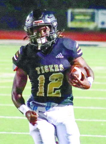 Junior Armari Durham runs for a touchdown in a game against Towns County earlier this season. Last week, Durham ran for 105 yards and two touchdowns. BRENDAN KOERNER/Staff