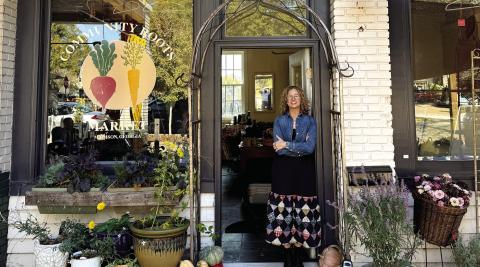 Cindi Fetch, owner of Community Roots, lost more than half of her space inside the market as a result of the building’s fire in July. She is finding creative ways to use front space that wasn’t impacted from the damage. CONTRIBUTED