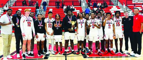 The Morgan County boys basketball team poses for a photo after defeating Westside (Macon) 54-40 on Saturday to win the Region 4-AA championship. CONTRIBUTED