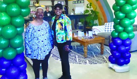 Lake and Local downtown featured a Mardi Gras balloon arch for picture taking MAUREEN STRATTON/Staff