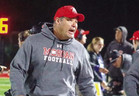 Morgan County head coach Clint Jenkins speaks to his team after a win over ARC last seaosn. LANCE McCURLEY/Staff