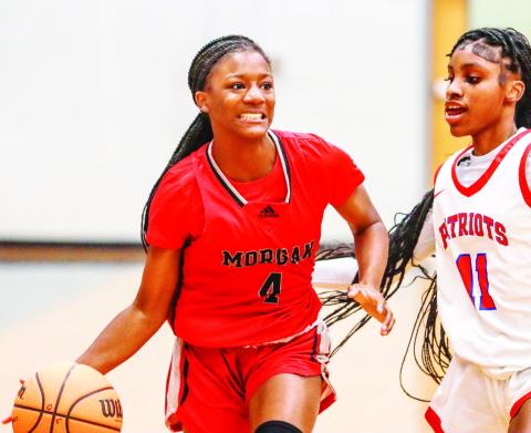 Kymora Smith (4) brings the ball up the court in a road loss to Oglethorpe County on Nov. 14. LANCE McCURLEY/Staff
