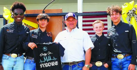 Georgia Agriculture Commissioner Tyler Harper (center) took time for a photo op with Georgia Dairy Youth Foundation junior board members (l-r) Seth Harris, Christian Page, Luke Huff and Caden Swartz.