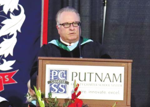 Putnam County Superintendent Eric Arena approves of all the graduates so they may receive their diplomas.