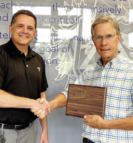 Founding board member Dick Schmidt (right) was recognized by Lake Oconee Academy June 2. Schmidt will step away from the board after serving since 2006. HANNAH BARRON/Staff