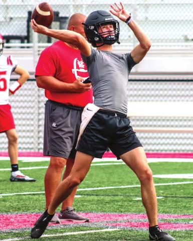 Morgan County quarterback Talan Fuller gets ready to send a ball sailing downfield to a Bulldogs’ receiver. LANCE McCURLEY/Staff