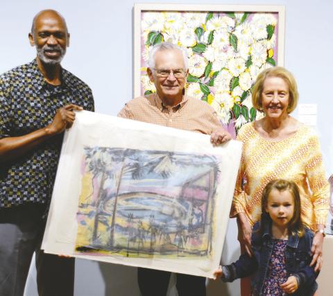 STMA Executive Committee President Don Roman with Lisa Thomas Conner presented “House by Pond,” a Steffen Thomas original drawing, to Board Treasurer Bob Cuellar (center), whose term recently expired. Board VP Brian Titus also has timed out from STMA’s board, but he was not present at the Aug. 19 meeting.