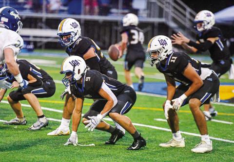 The LOA defense was a huge part of this past week's close win over Brentwood Academy. Reid Davis (9) totaled 10 tackles, including a tackle for loss and a fumble recovery. (CHARLES JORDAN/Staff)