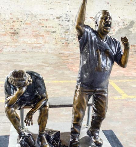 The thrill of victory versus the agony of defeat is captured by "Da Fans" by South Dakota artists Lee Lanning and Sherri Treeby. (IAN TOCHER/Staff)