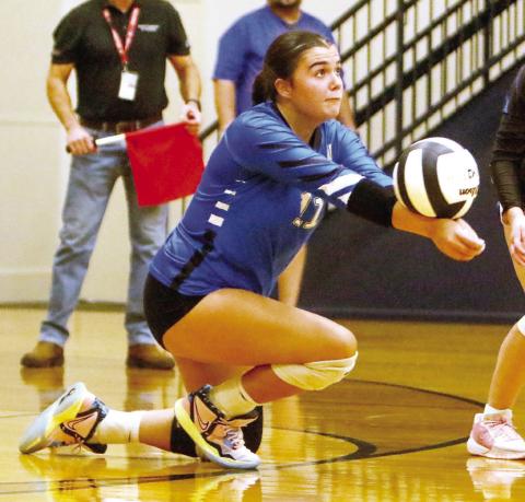 LOA junior outside hitter Bailey Pattison (11) has made a significant impact for the Lady Titans so far this season. (LANCE MCCURLEY/Staff)