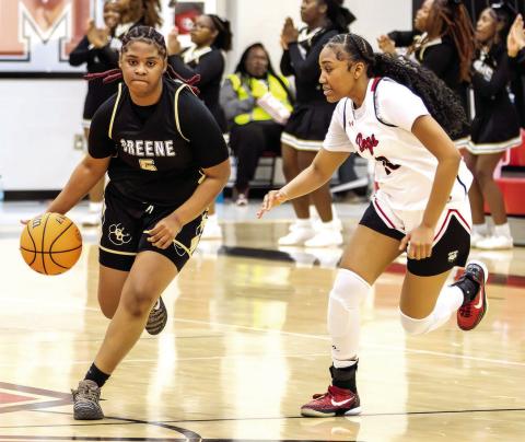 Greene County guard Denver McCommons (5) advances the ball up the court in a game against Morgan County on Dec. 9. SKYLA MORRIS/Staff