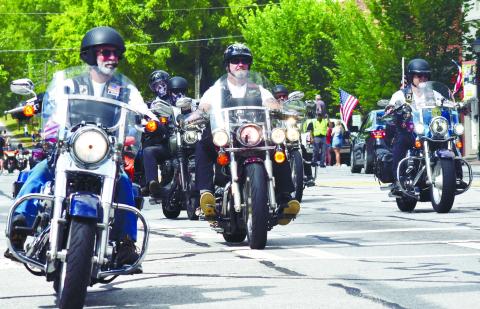 "Rolling Thunder" in the form of more than 1,000 motorcycles roared through Madison on Memorial Day to honor fallen heroes. T. MICHAEL STONE/Staff