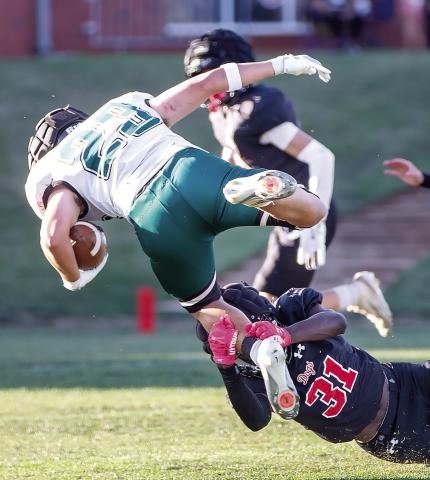 Morgan County cornerback Najir Rivers (31) brings down a Walnut Grove ball carrier. SKYLA MORRIS/Staff