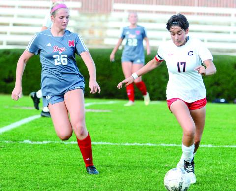 Morgan County midfielder Rylee Bernard (26) during a game last season against Clarke Central. She has played a key role as a leader for the Lady Dogs’ success in 2024. LANCE McCURLEY/Staff