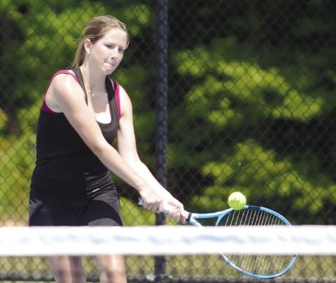 Titans’ No. 2 singles player Willa Kent uses her backhand to return a GMC Prep serve.