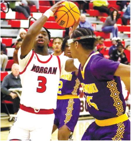 Bulldogs’ senior TJ Thompson (3) gets set to go up for a layup over an ARC defender after driving the lane. LANCE McCURLEY/Staff