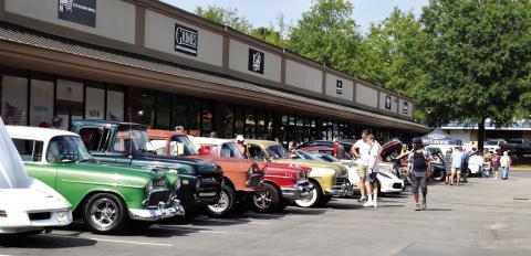 Dozens of hot-rodded rides showed up Saturday for the inaugural Bruzze Brewing Classic Car Show, staged in honor of Jerry Smith, who once operated a car museum in the same space the brewery now occupies alongside Scott Road in eastern Putnam County. (T. MICHAEL STONE/Staff)