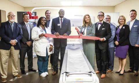 Morgan Medical Center staff, GE Health representatives, and local leaders cut the ceremonial ribbon to celebrate the facility’s milestone in nuclear medicine technology. SKYLA MORRIS/Staff