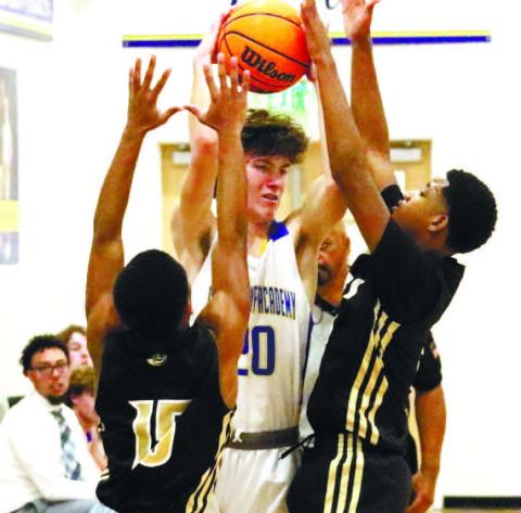 Two Tiger defenders trap senior Lawson Shurling (20) in the backcourt midway through the first half when Greene County started its defensive run. BRENDAN KOERNER/Staff