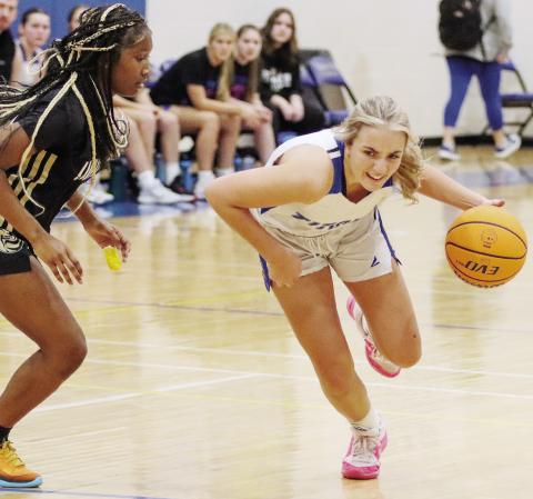 Lake Oconee Academy senior guard Georgia Bosart (right) has played a huge role in her team's success this season. LANCE MCCURLEY/Staff