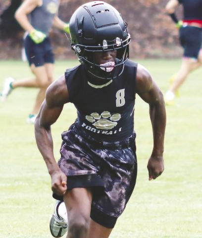 Greene County’s Tamari Roberts runs down the field during a scrimmage at a Kirby Smart 7-on-7 camp at UGA in Athens in June. LANCE McCURLEY/Staff