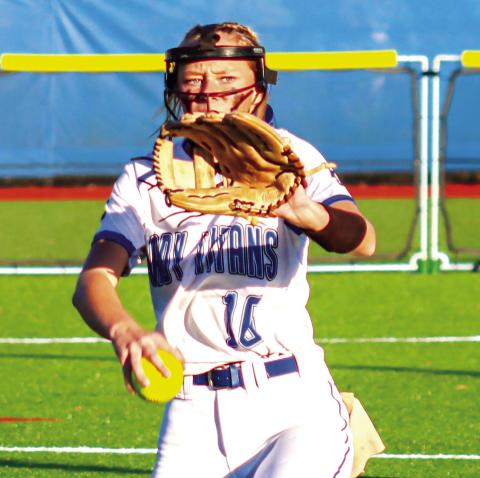 Jacy Singleton in the wind-up in a playoff game against GMC Prep during her junior year at LOA. She recently signed a letter of intent to continue her softball career with Georgia College. LANCE McCURLEY/Staff