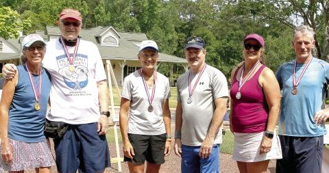 Medal winners (l-r) Sue Hagen, Walter Straus, Lisa Soeters, Billy Adams, and Linda and John Fitzpatrick. (LEIGH LOFGREN/Staff)