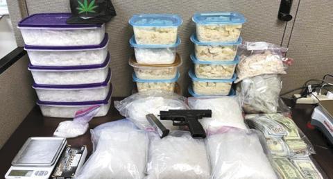 Law enforcement agencies seized 39 kilos of meth, handguns and $32,000 in cash. CONTRIBUTED