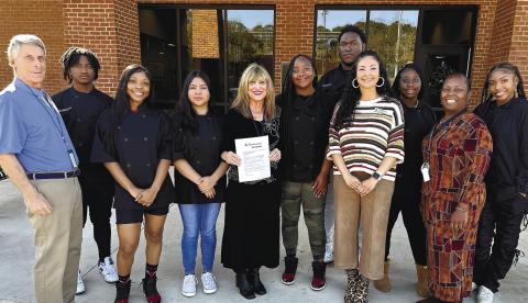 Culinary pathway students, Instructor Felicia Hodges, CTAE Director Mariana Mansfield, and representatives of the Thillen Education Foundation Leslie Clark and Dave Thillen pose together. CONTRIBUTED