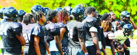 A lot of Greene County players awaiting their turn to step into the “Oklahoma” drill over the summer. BRENDAN KOERNER/Staff