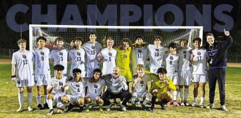 The Lake Oconee Academy Titans pose for a team photo after they defeated Lincoln County on March 28 to secure the Class A Division II region championship. CONTRIBUTED