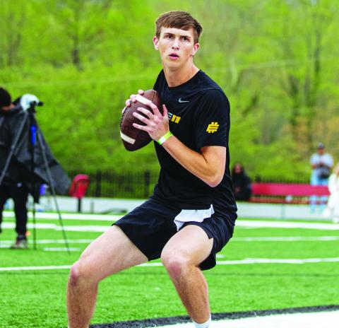Davis Strickland drops back to pass during a drill at the Elite 11 camp in Gainesville on March 30. CONTRIBUTED