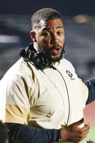 Greene County head coach Darius Robinson talks with his team after the scrimmage against Northeast (Macon) on Aug. 8. LANCE McCURLEY/Staff