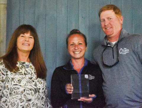 Jeff and Alanna Davis, owners of Window Wizardz, receive the Heartbeat Award. HANNAH BARRON/Staff