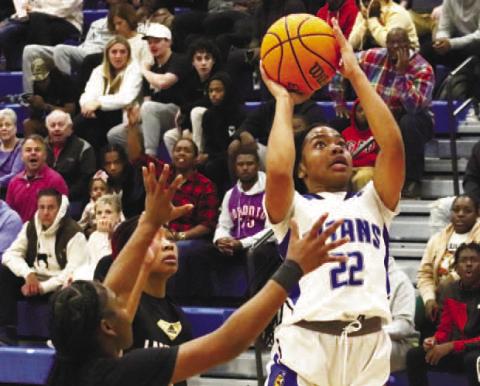 Titans’ guard Jada Williams (22) returned from an injury she suffered earlier in the week to play against the Tigers. One of Williams many baskets made in the first half. BRENDAN KOERNER/Staff