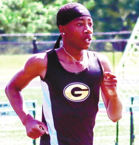 Dennis during the 1600-meter race at the Region 8A-Public meet in April. LANCE McCURLEY/Staff