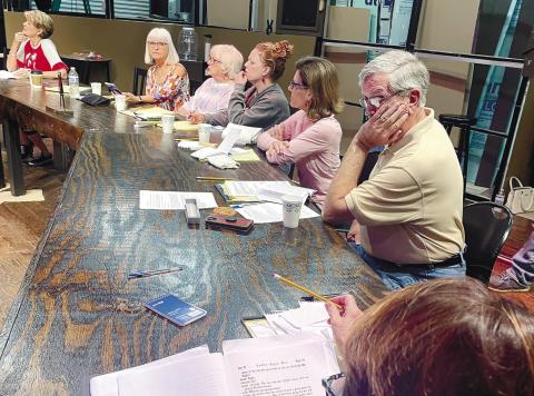 Actors ponder their lines as they rehearse together and prepare for the Nov. 9 opening of 12 Angry Jurors at The Plaza Arts Center. CONTRIBUTED