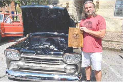 Ken Bishop of Rutledge beside his immaculate 1959 Chevy Apache pickup which won the coveted Best in Show award. T. MICHAEL STONE/Staff