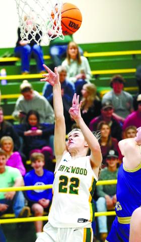 Senior Anna Williamson (22) throws up a floater in Friday’s loss to the Lady Eagles. DR. BOB BETZEL/Contributed