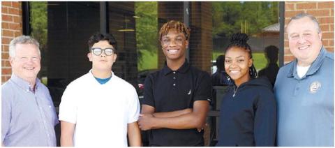 Pictured are, from left, Bill Bonnington, Rotary; Andrew Mauriello, Henry Mitchell, Tiejah Darby, John Ellenberg, GCCA CEO. Not pictured is Laryous Burt. CONTRIBUTED