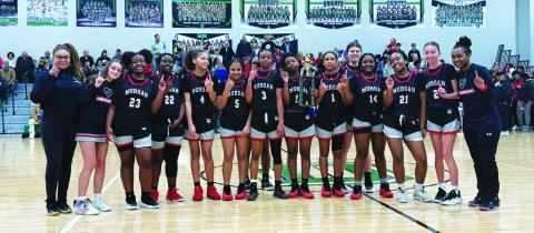 The Morgan County Middle School girls basketball team poses for a photo after defeating Oconee County Middle School to win the league championship. CONTRIBUTED