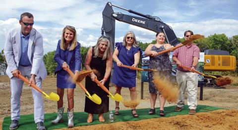 Josh and Lauren Sprayberry (left) were joined by family members in a ceremonial groundbreaking last Thursday for the Len Resort &amp; Residences, slated for completion in May 2026 on the Putnam County shores of Lake Oconee. IAN TOCHER/Staff