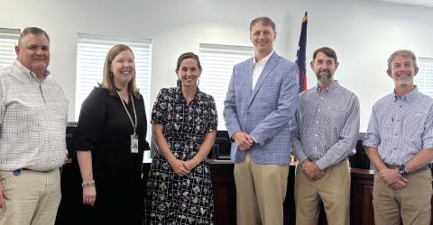 Morgan County High School ag teacher Rachel Kinsaul (center) is recognized by the Morgan County Board of Education for being named the 2026 Georgia Teacher of the Year. HANNAH BARRON/Staff